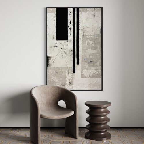 Minimalistyczny obraz 130x80 zawieszony nad designerskim fotelem w minimalistycznym wnętrzu