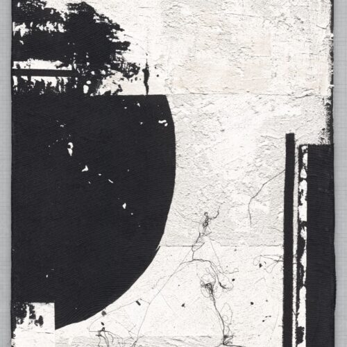 Zbliżenie reprodukcji Diptico Dois autorstwa Hanny Dymarczyk z abstrakcyjną czarno-białą kompozycją